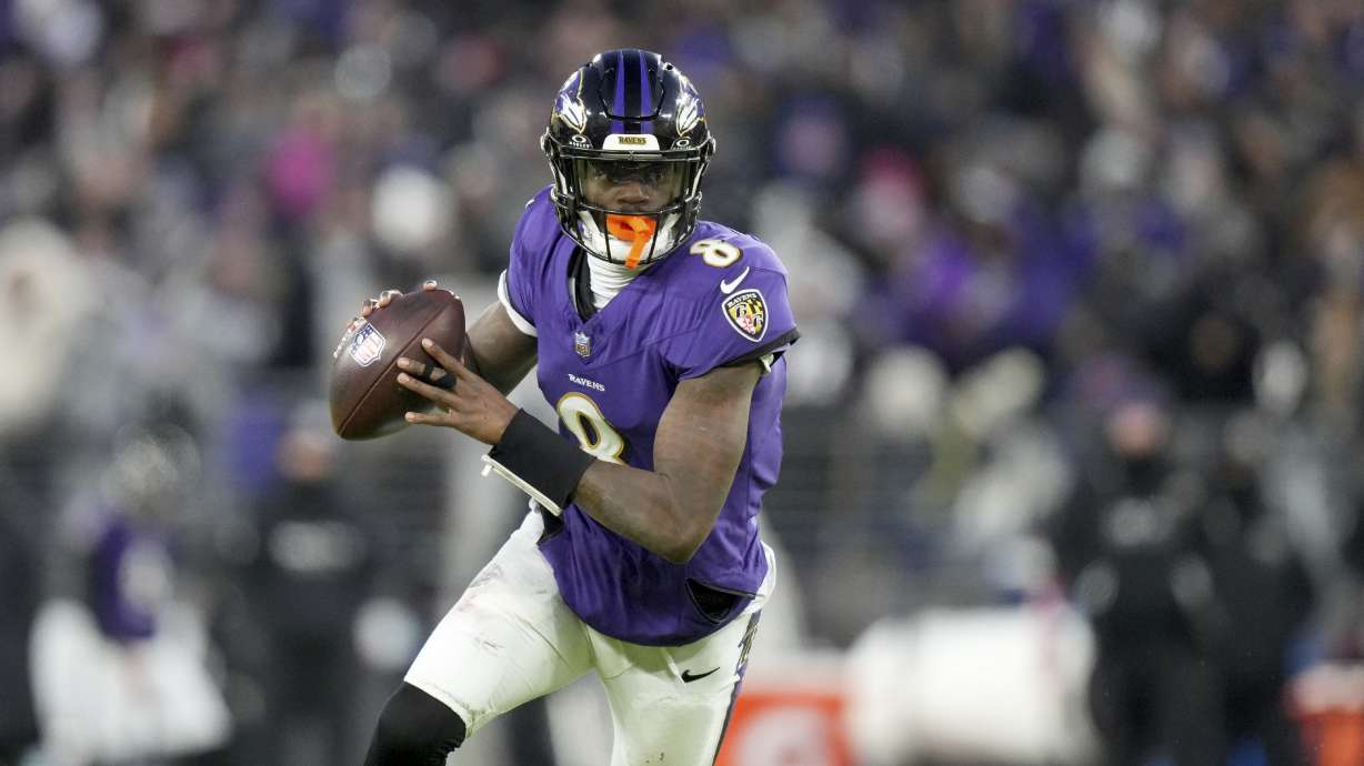 Baltimore Ravens quarterback Lamar Jackson scrambles during the first half of an NFL football game against the Cleveland Browns Saturday, Jan. 4, 2025, in Baltimore.