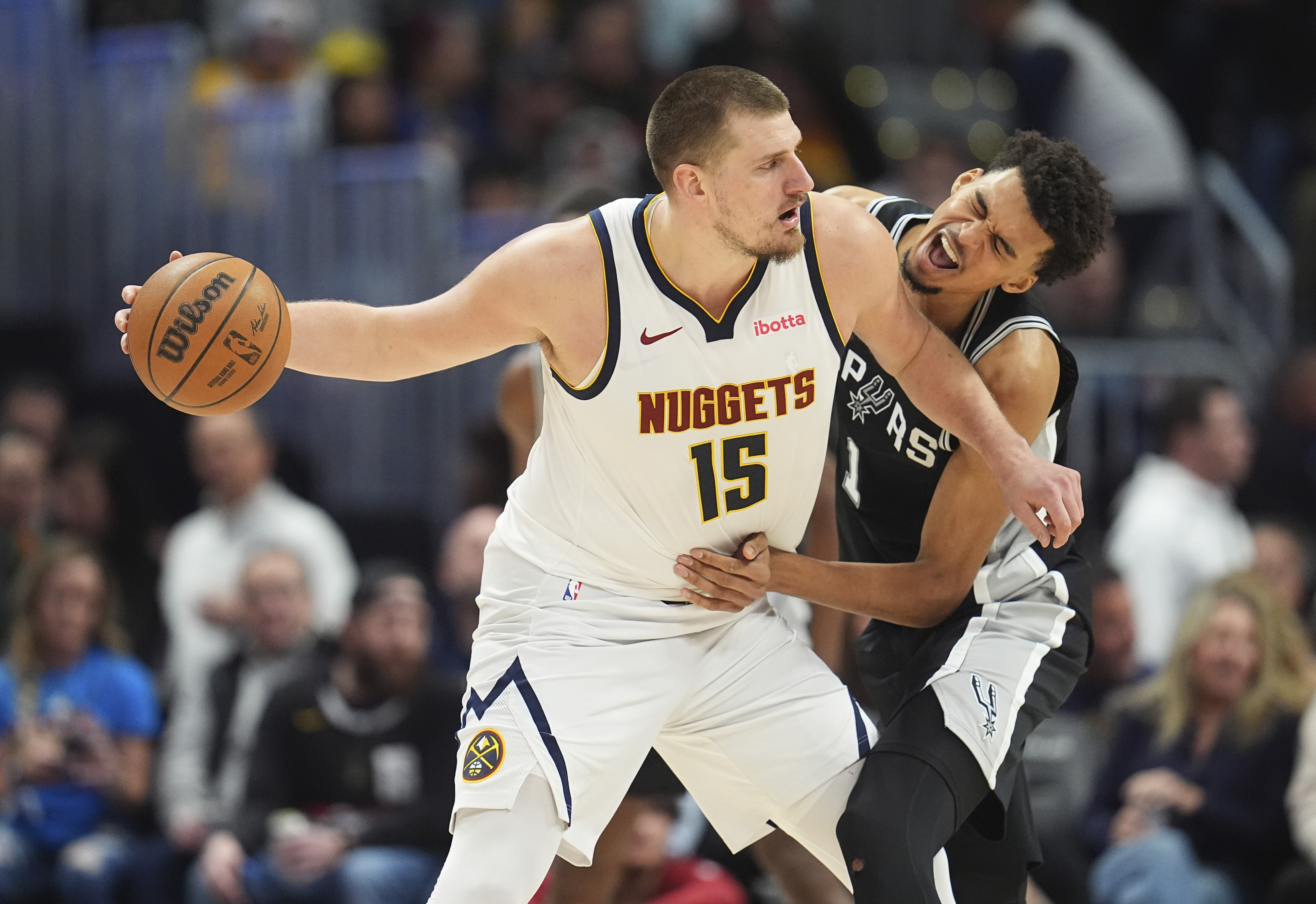 Jokic and Nuggets beat the Spurs 122-111 in overtime to spoil Wembanyama's 21st birthday