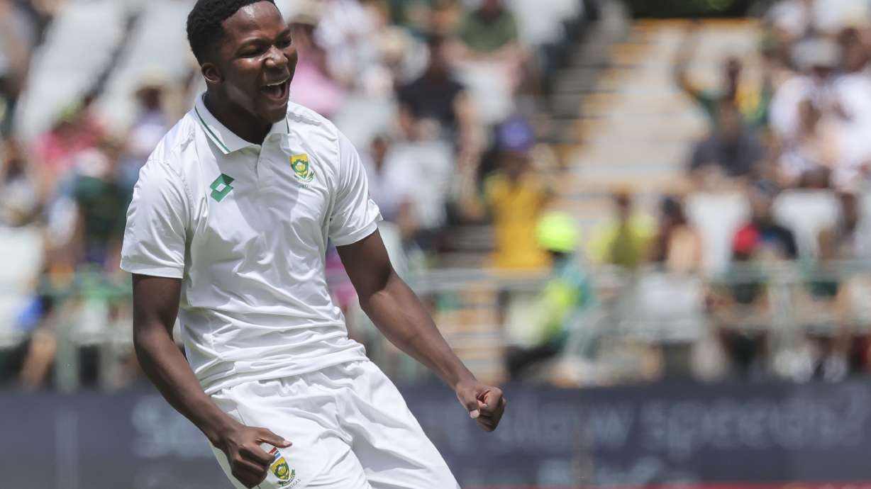 South Africa's Kwena Maphaka celebrates his debut test wicket that of Pakistan's Babar Azam during the third day of the second Test match between South Africa and Pakistan in Cape Town, South Africa, Sunday, Jan. 5, 2025.