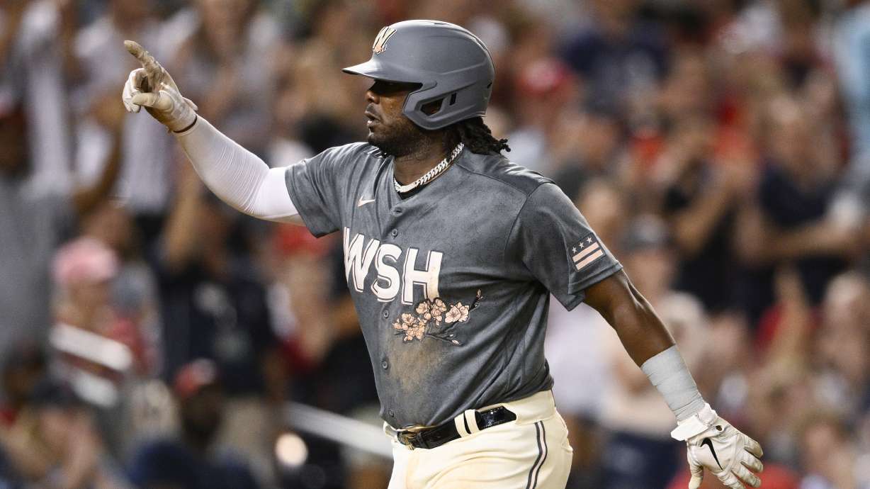 FILE - Washington Nationals' Josh Bell celebrates his three-run home run during the seventh inning of the team's baseball game against the St. Louis Cardinals, July 30, 2022, in Washington.