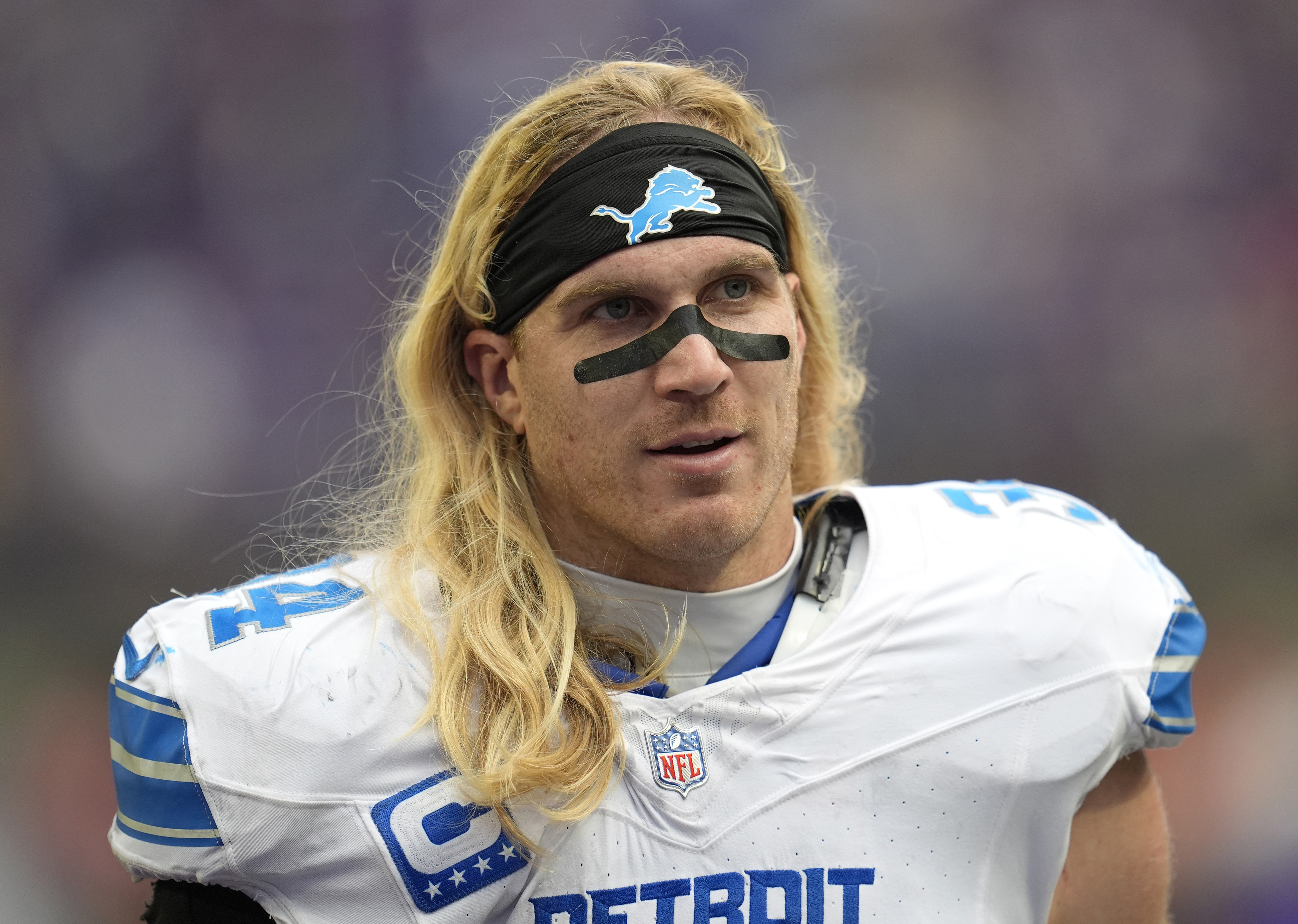 FILE - Detroit Lions linebacker Alex Anzalone walks off the field after an NFL football game against the Minnesota Vikings, Oct. 20, 2024, in Minneapolis.