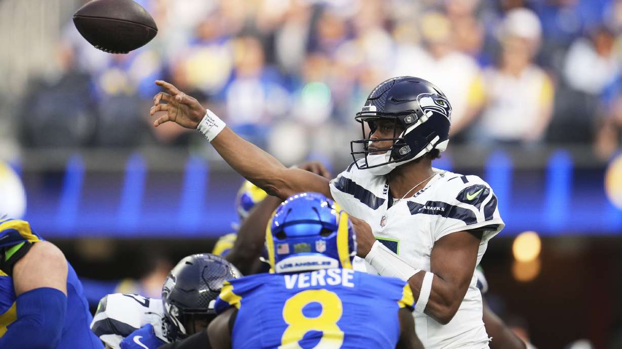 Seattle Seahawks quarterback Geno Smith throws a pass during the first half of an NFL football game against the Los Angeles Rams, Sunday, Jan. 5, 2025, in Inglewood, Calif.