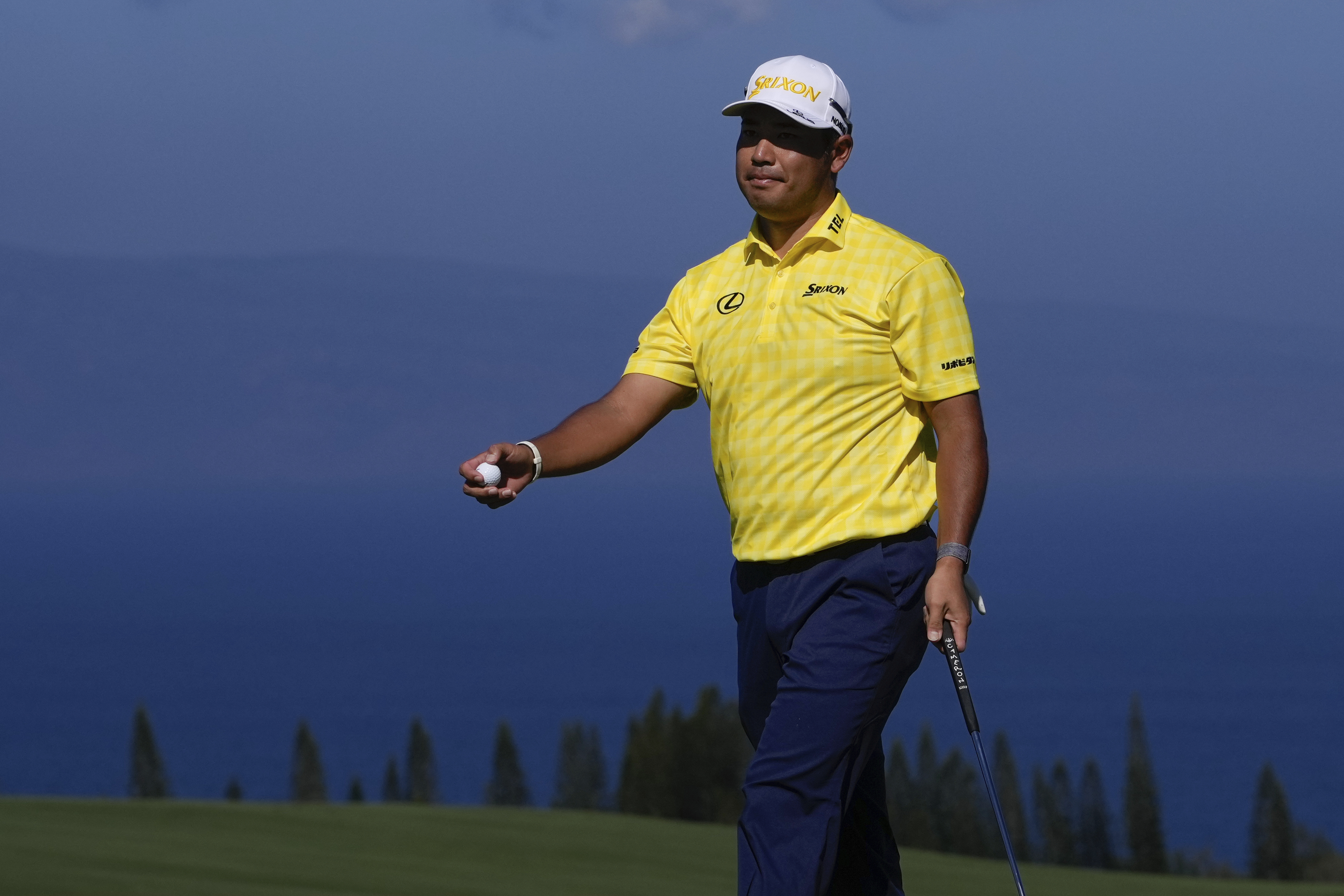 Hideki Matsuyama, of Japan, reacts after missing birdie on the fourth green during the final round of The Sentry golf event, Sunday, Jan. 5, 2025, at Kapalua Plantation Course in Kapalua, Hawaii.