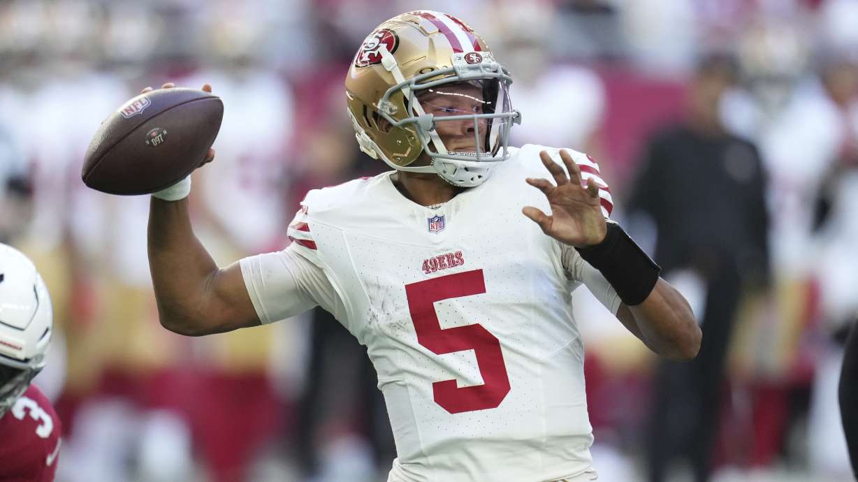 San Francisco 49ers quarterback Joshua Dobbs (5) looks to pass against the Arizona Cardinals during the first half of an NFL football game in Glendale, Ariz., Sunday, Jan. 5, 2025.