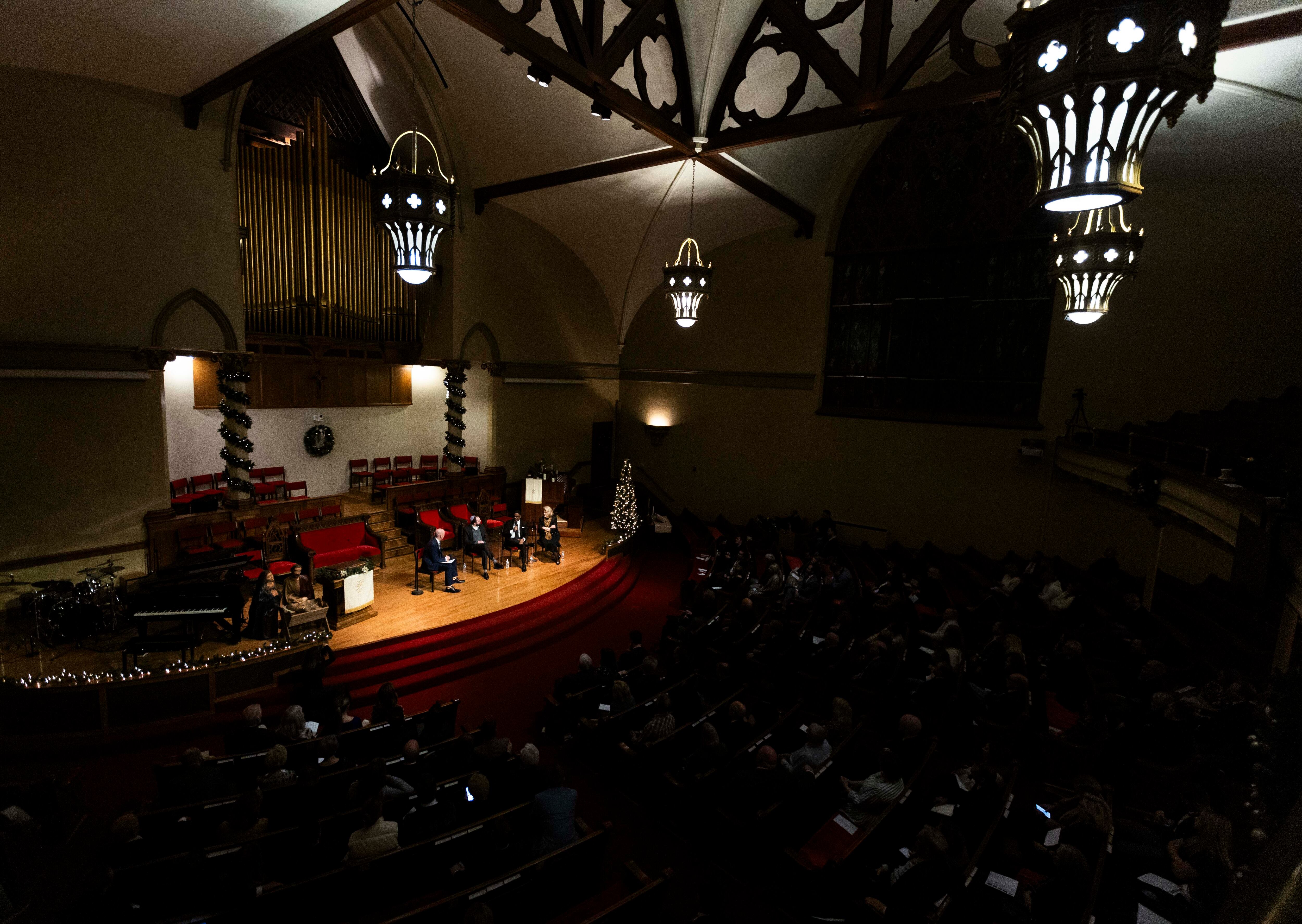 Gov. Spencer Cox, Rabbi Avremi Zippel, from the Chabad Lubavitch of Utah, Pastor Corey J. Hodges, from The Point Church, and Sheri Dew, executive vice president of Deseret Management Corporation, all discuss with each other during a Utah Interfaith Fireside panel discussion at the First Presbyterian Church of Salt Lake City in Salt Lake City on Sunday.