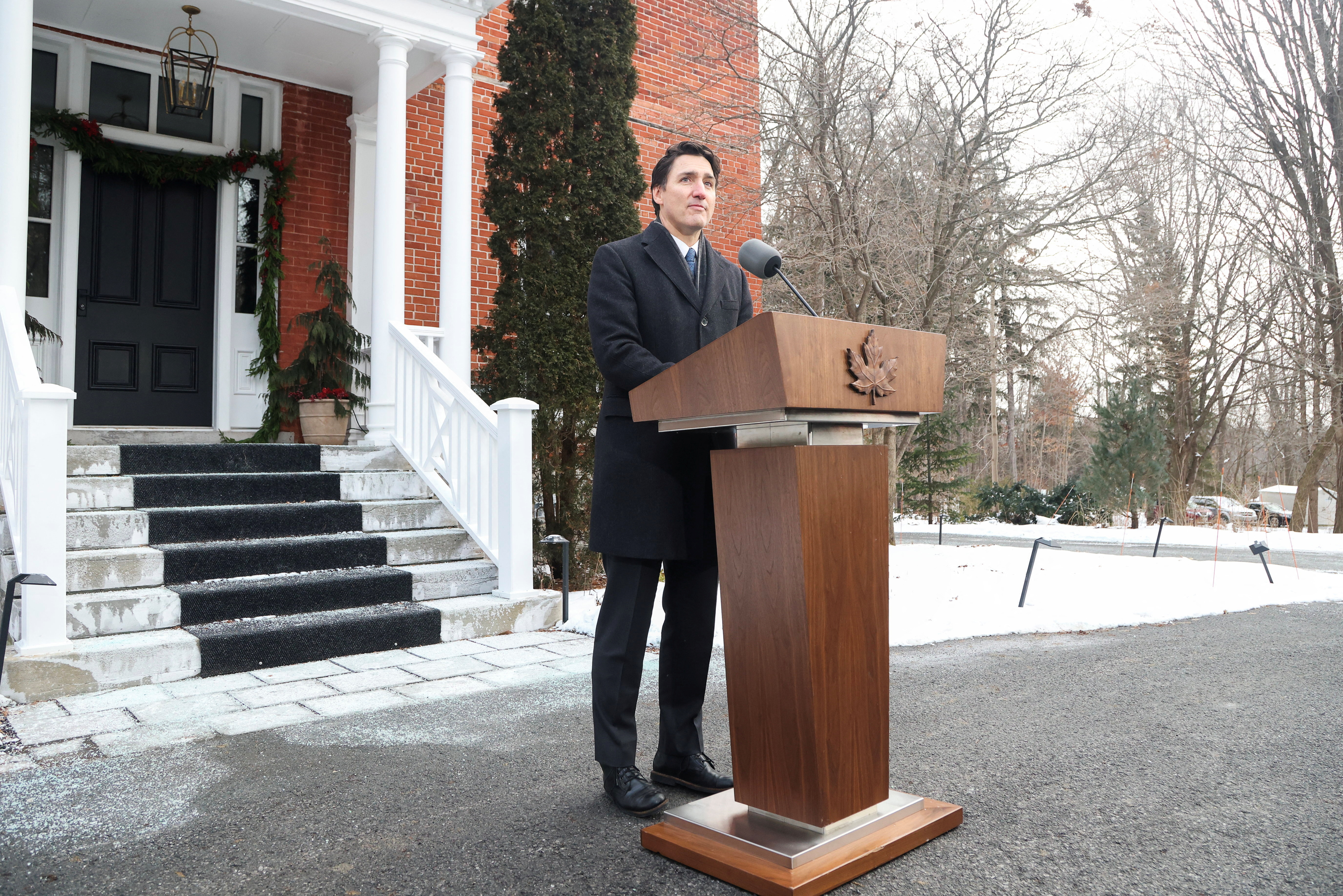Canada's Prime Minister Justin Trudeau speaks to reporters, announcing he intends to step down as Liberal Party leader and Prime Minister, but he will stay on in his post until a replacement has been chosen, from his Rideau Cottage residence in Ottawa, Ontario, Canada, Monday.
