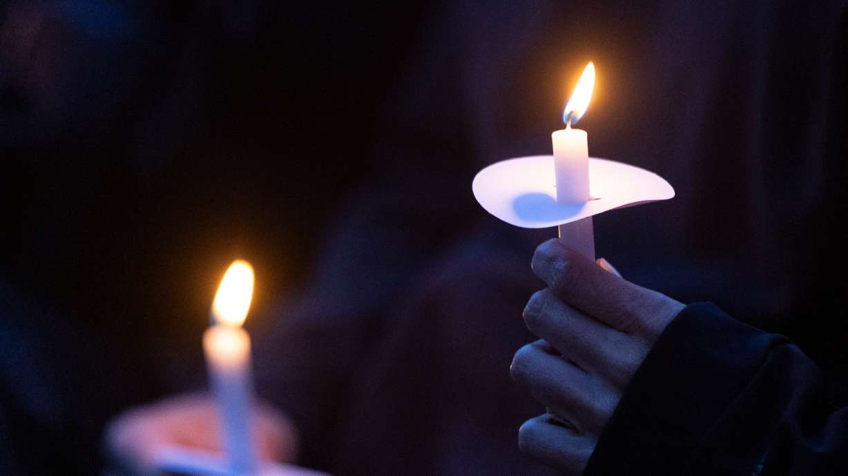 A candlelight vigil is held for Santaquin Police Sgt. Bill Hooser in Santaquin on May 8, 2024. There were 100 homicides in Utah during 2024, according to statistics compiled annually by KSL.com.