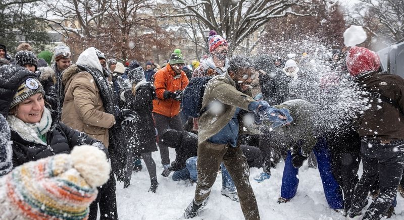 People participate in snowball fight at Meridian Hill Park, as a winter storm that brought snow, ice and freezing temperatures to a broad swath of the U.S. hits Washington, Monday.