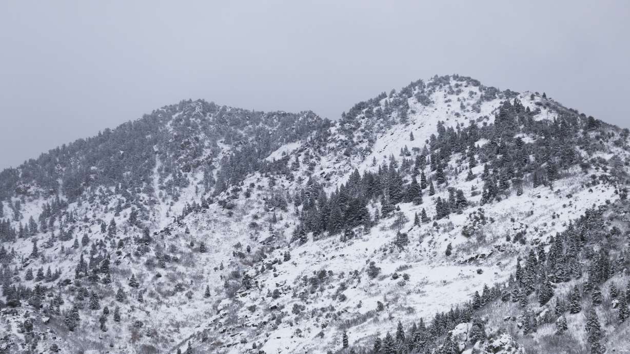 Snow-covered mountains seen from the entrance to Big Cottonwood Canyon on Saturday. Utah transportation officials say strong winds in the forecast Tuesday and Wednesday could create blowing snow in the Wasatch Back.