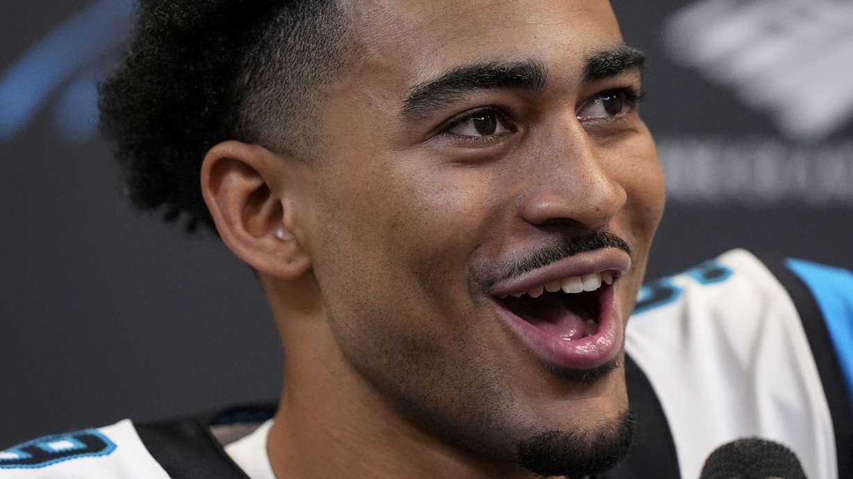 Carolina Panthers quarterback Bryce Young speaks after an NFL football game against the Atlanta Falcons, Sunday, Jan. 5, 2025, in Atlanta.