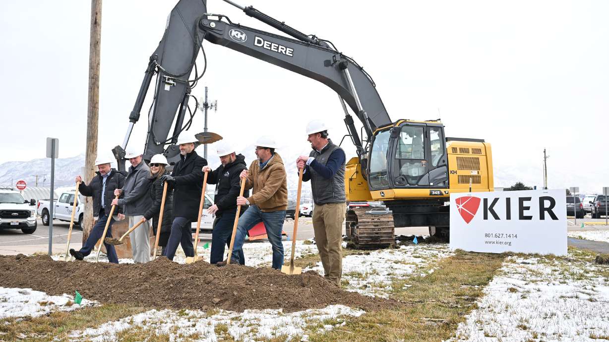 City, airport and construction officials gather at Ogden-Hinckley Airport to break ground for a new expansion project on Monday. The project is expected to be completed later this year.