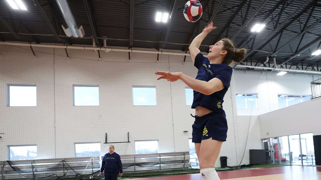 Roni Jones-Perry, a former BYU Cougar, hits as members of League One Volleyball (LOVB), a professional women's volleyball league, practice in North Salt Lake on Tuesday, Dec. 17, 2024.