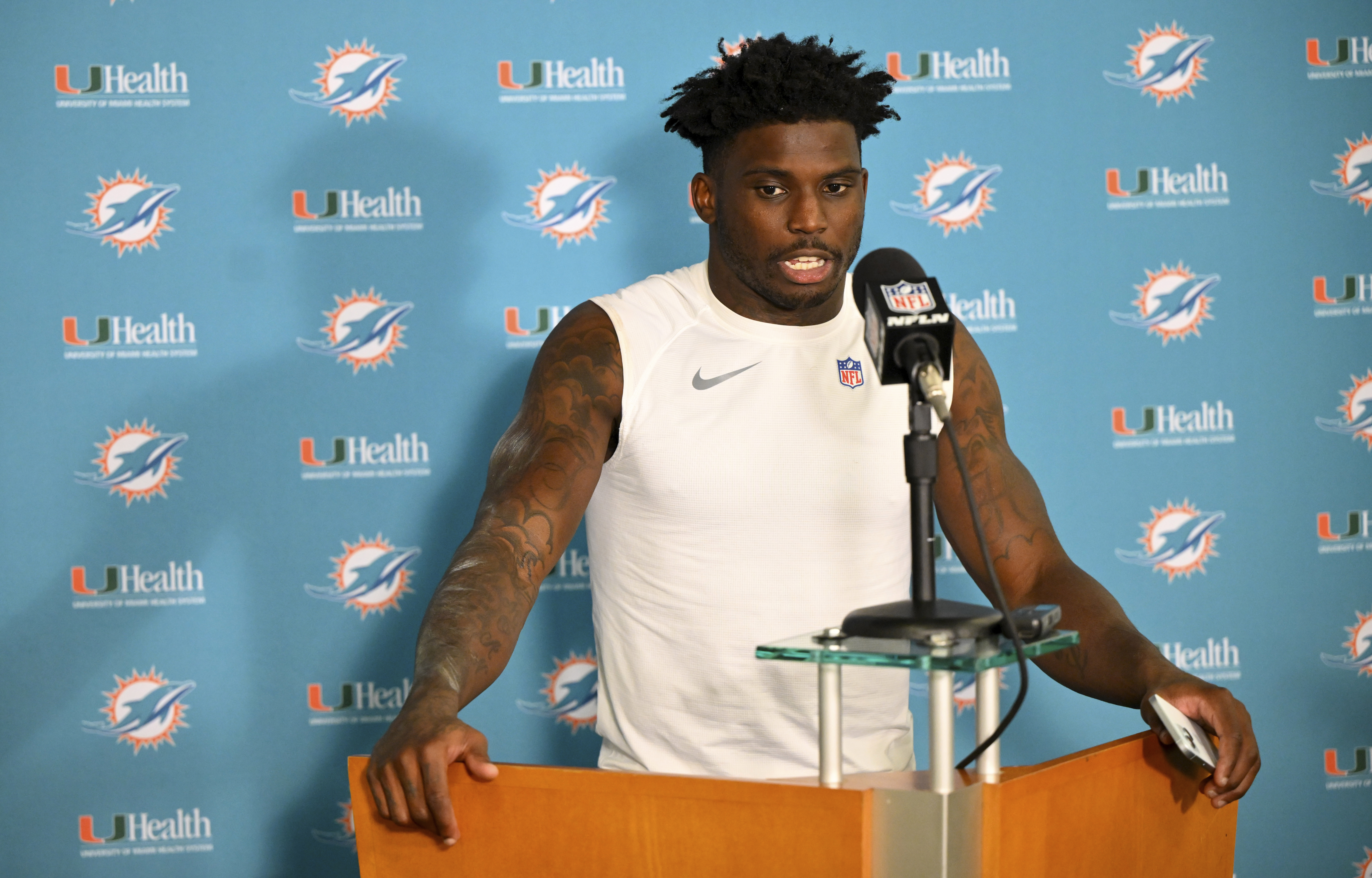Miami Dolphins wide receiver Tyreek Hill speaks during a news conference after an NFL football game against the Cleveland Browns Sunday, Dec. 29, 2024, in Cleveland.