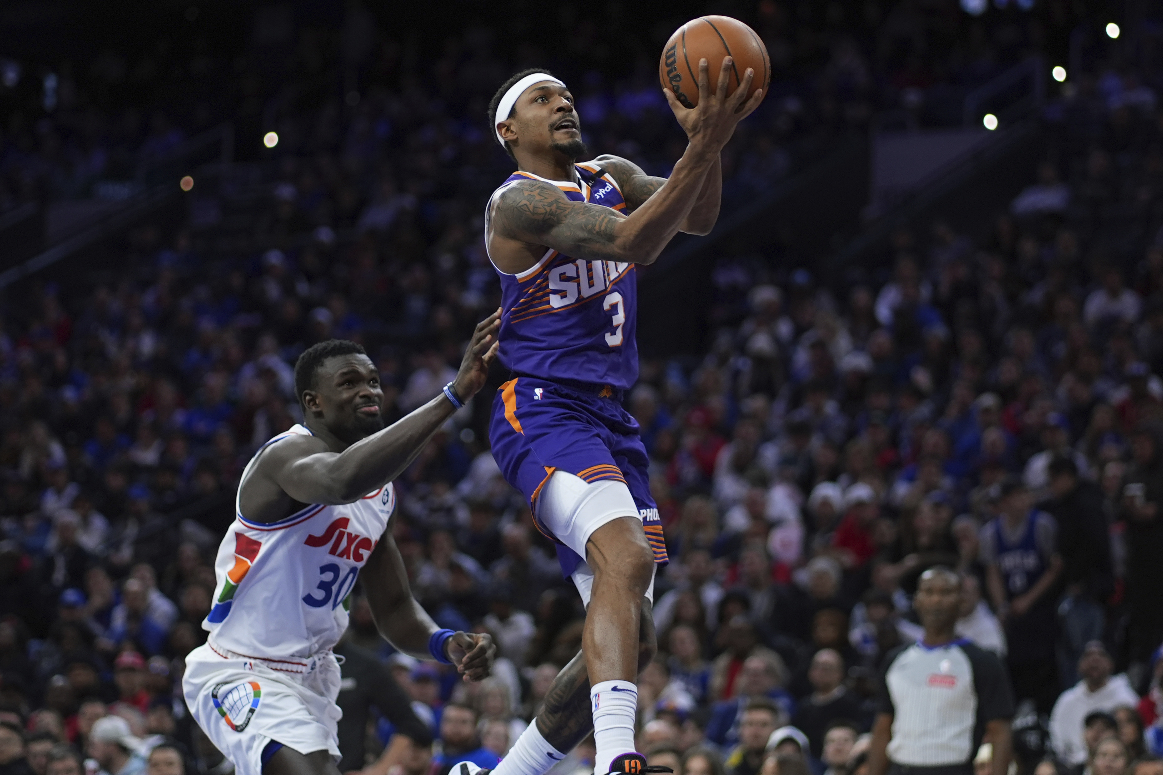 Bradley Beal comes off the bench to score 25 as Suns top 76ers 109-99 to end 4-game skid