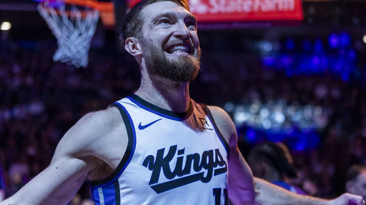 Sacramento Kings center Domantas Sabonis reacts up before an NBA basketball game against the Miami Heat, Monday, Jan. 6, 2025, in Sacramento, Calif.