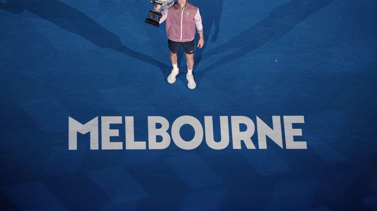 FILE - Jannik Sinner of Italy poses with the the Norman Brookes Challenge Cup after defeating Daniil Medvedev of Russia in the men's singles final at the Australian Open tennis championships at Melbourne Park, in Melbourne, Australia, Jan. 28, 2024.