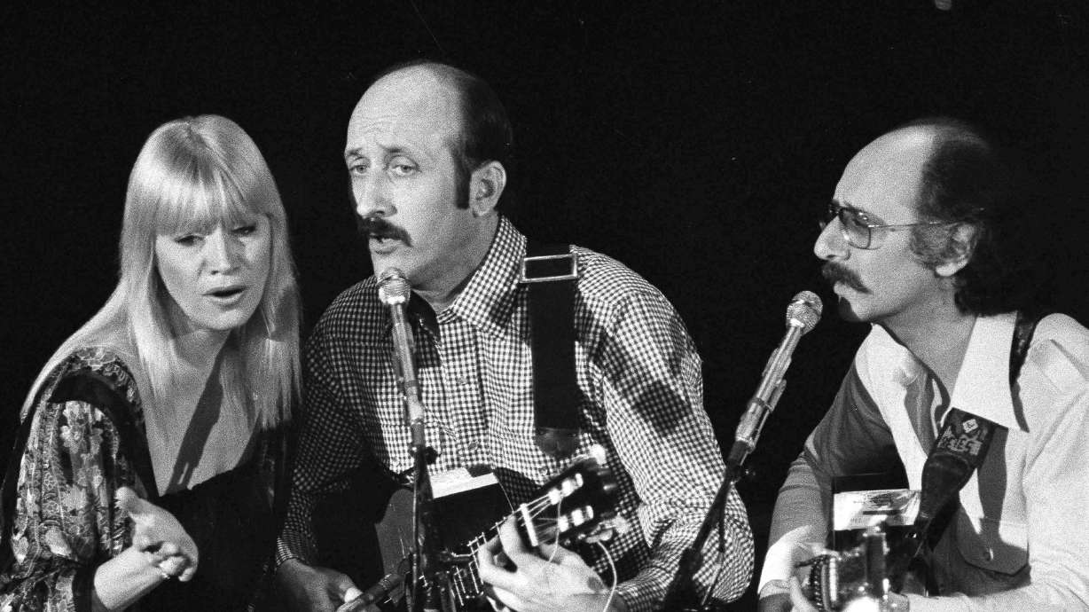 Folk trio Peter, Paul and Mary, from left, Mary Travers, Paul Stookey and Peter Yarrow, perform at a Los Angeles benefit to aid to Cambodian refugees on Jan. 30, 1980. Yarrow died Tuesday.