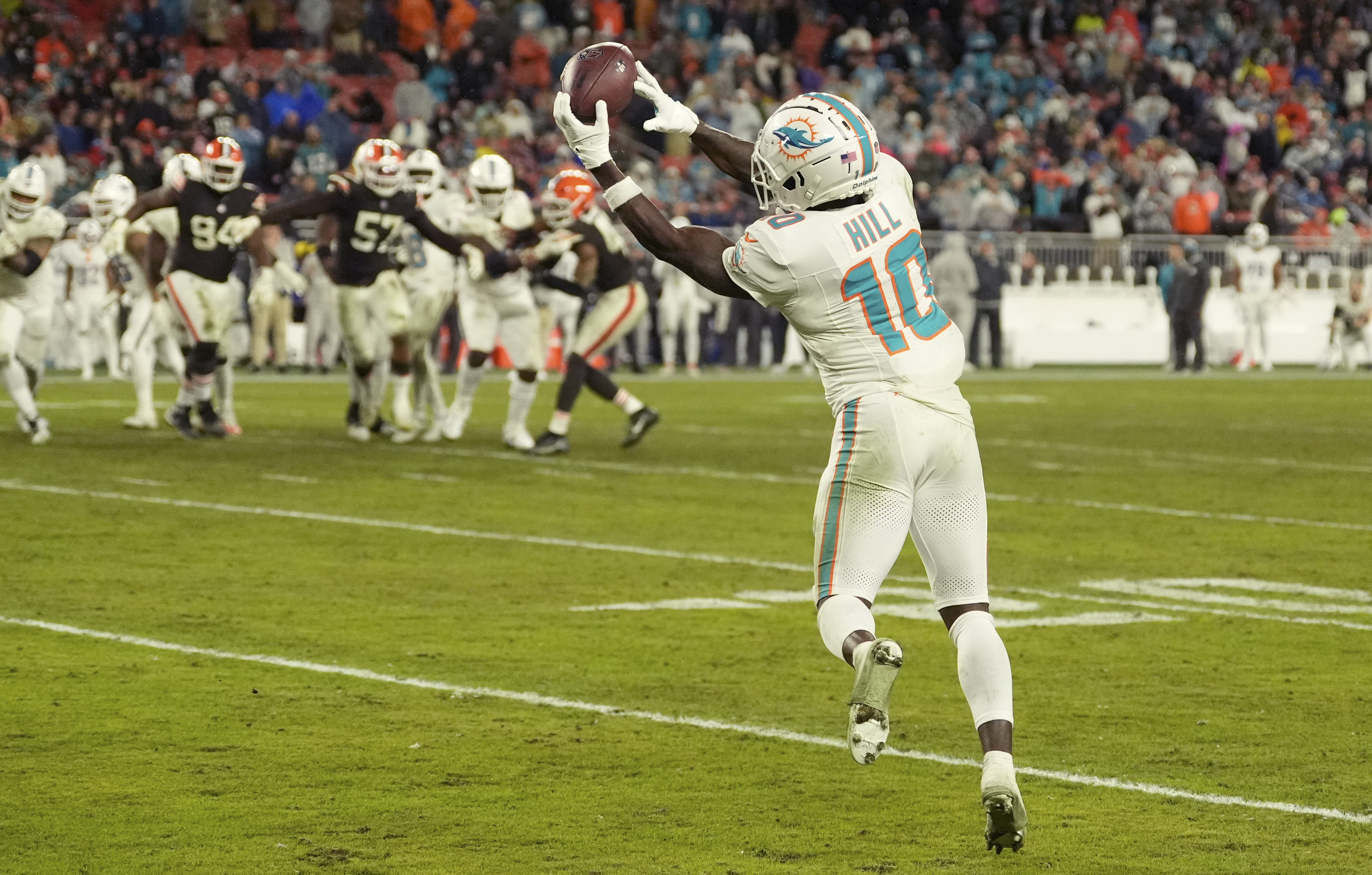 Miami Dolphins wide receiver Tyreek Hill (10) makes a catch during the second half of an NFL football game against the Cleveland Browns Sunday, Dec. 29, 2024, in Cleveland.