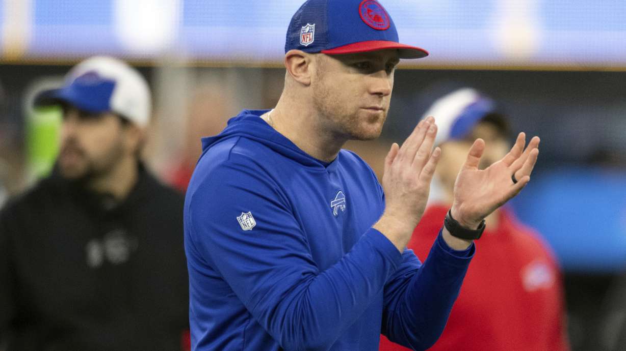 FILE - Buffalo Bills interim offensive coordinator Joe Brady looks on before an NFL football game against the Los Angeles Chargers, Dec. 23, 2023, in Inglewood, Calif.
