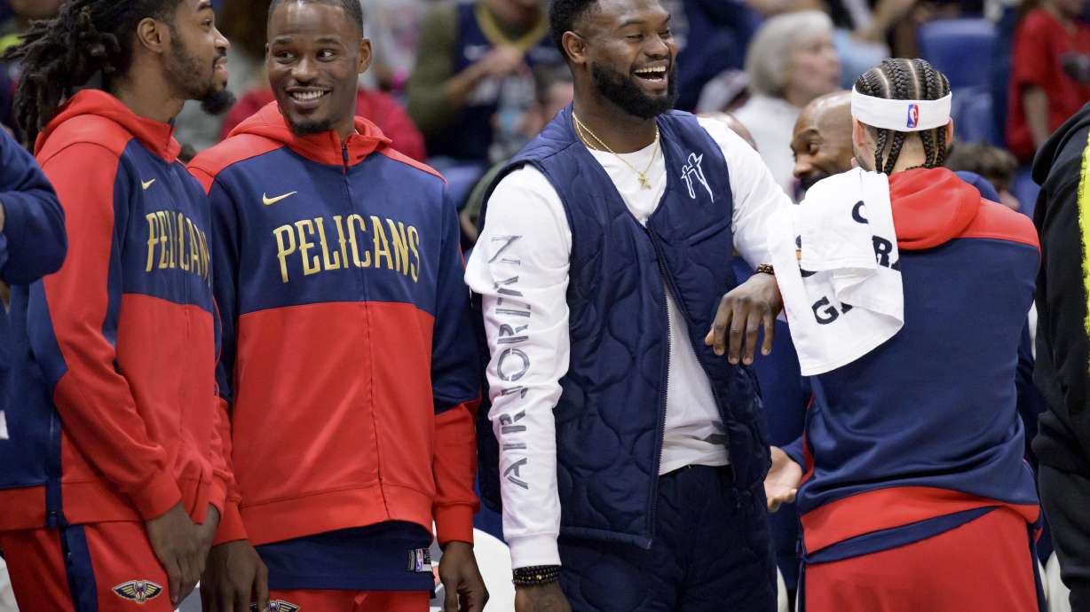 New Orleans Pelicans forward Zion Williamson, third from left, celebrates during the second half of an NBA basketball game against the Washington Wizards in New Orleans, Friday, Jan. 3, 2025.