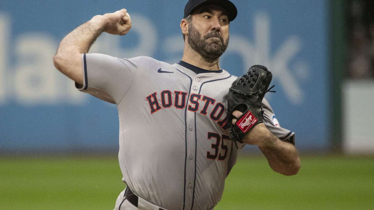 FILE - Houston Astros starting pitcher Justin Verlander delivers against the Cleveland Guardians during the first inning of a baseball game in Cleveland, Sept. 28, 2024.