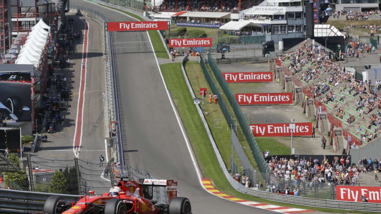 FILE - Ferrari driver Sebastian Vettel of Germany steers his car during the second free practice at the Spa-Francorchamps circuit, Belgium, on Aug. 21, 2015.