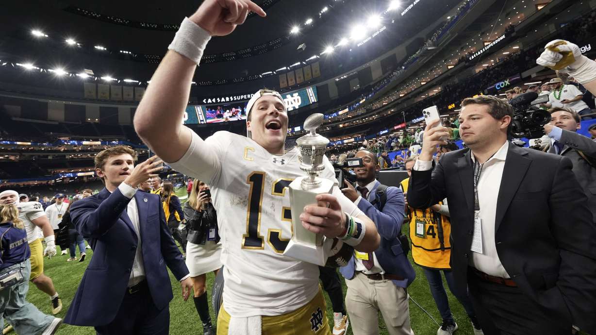 Notre Dame quarterback Riley Leonard (13) celebrates after a quarterfinal game against Georgia in a College Football Playoff, Thursday, Jan. 2, 2025, in New Orleans.