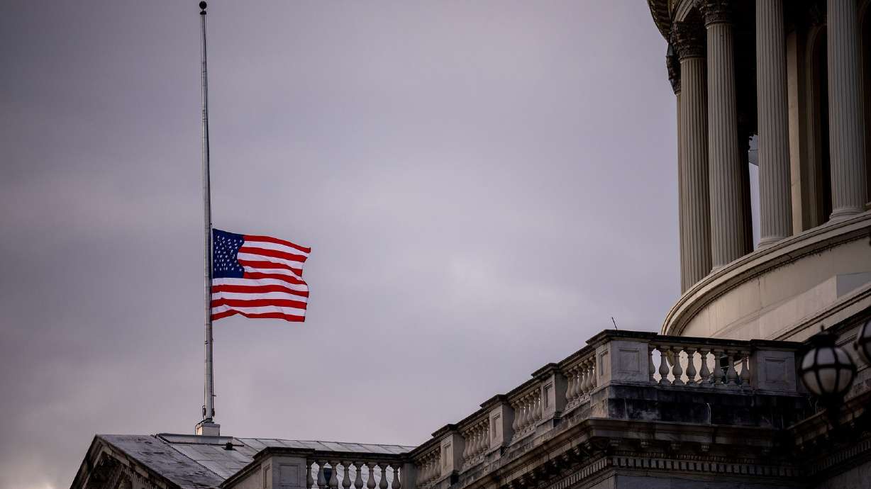A flag flies at half-staff for the death of former President Jimmy Carter at the U.S. Capitol building on Jan. 2. The U.S. will honor the late former President Jimmy Carter, who died at age 100 on Dec. 29 with Thursday as a day of mourning.