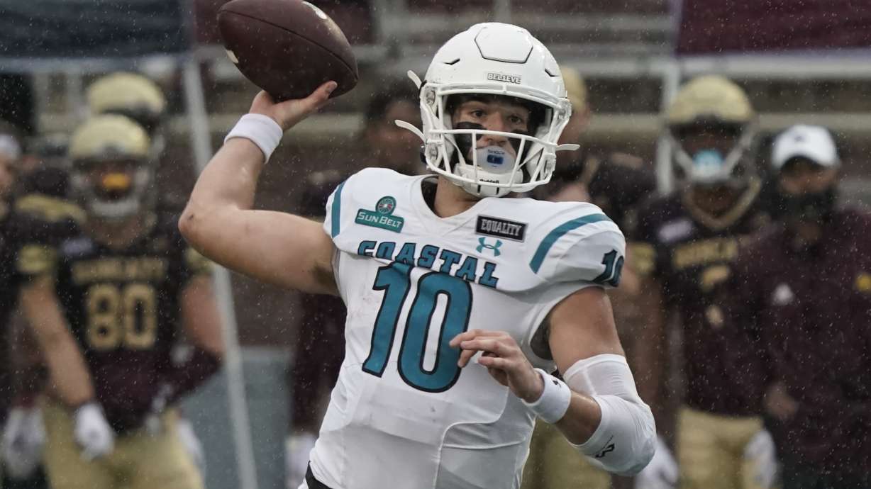 FILE - Then Coastal Carolina's Grayson McCall throws during the first half of an NCAA college football game against Texas State in San Marcos, Texas, Saturday, Nov. 28, 2020.