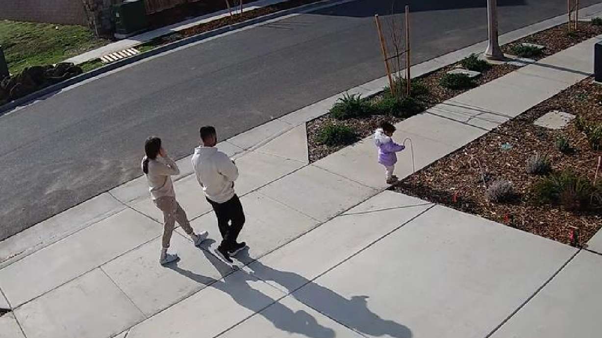 A family takes a walk before Christmas in Lindon, California.