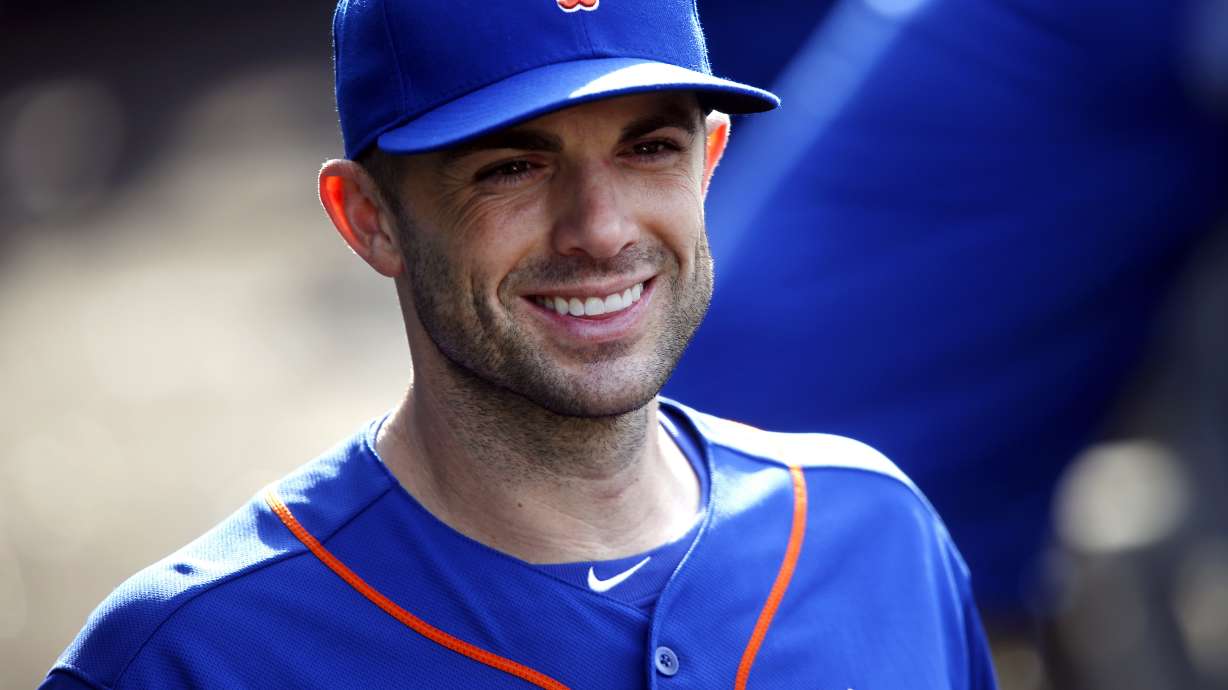 FILE - In this Sept. 30, 2018, file photo, New York Mets' David Wright returns to the dugout after an on-field ceremony during a baseball game against the Miami Marlins in New York.