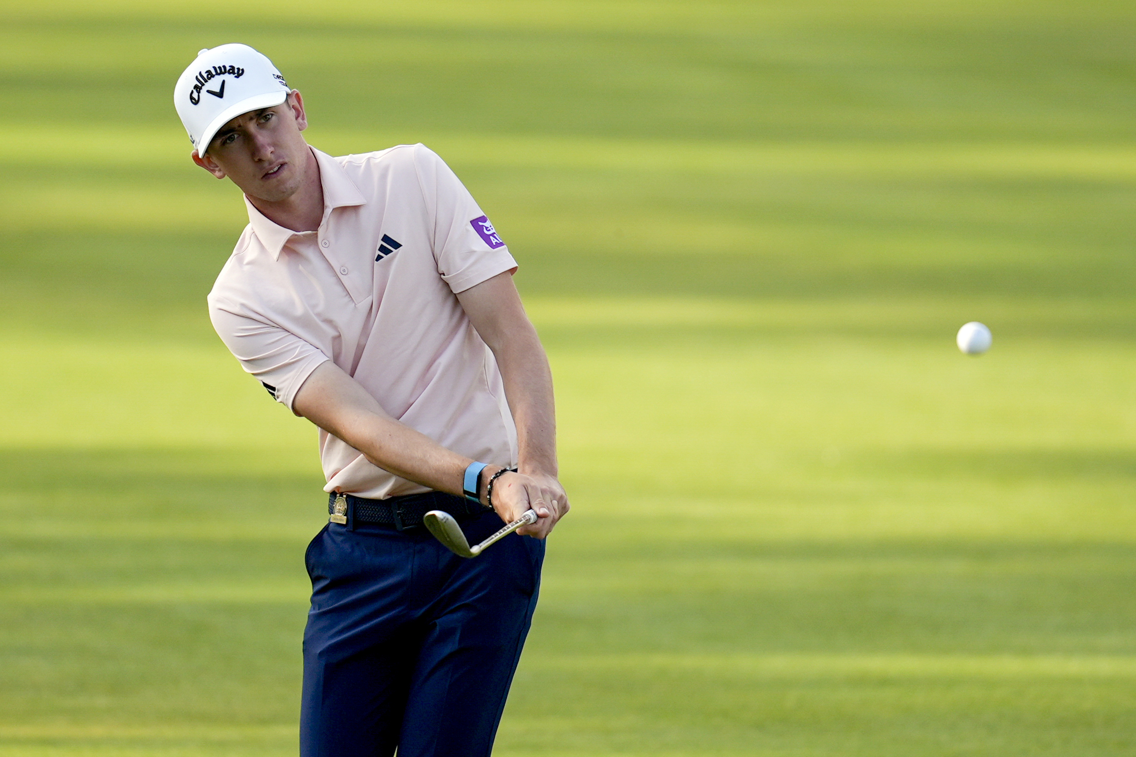 FILE - Tom McKibbin, of Northern Ireland, chips to the green on the 15th hole during the first round of the U.S. Open golf tournament Thursday, June 13, 2024, in Pinehurst, N.C.