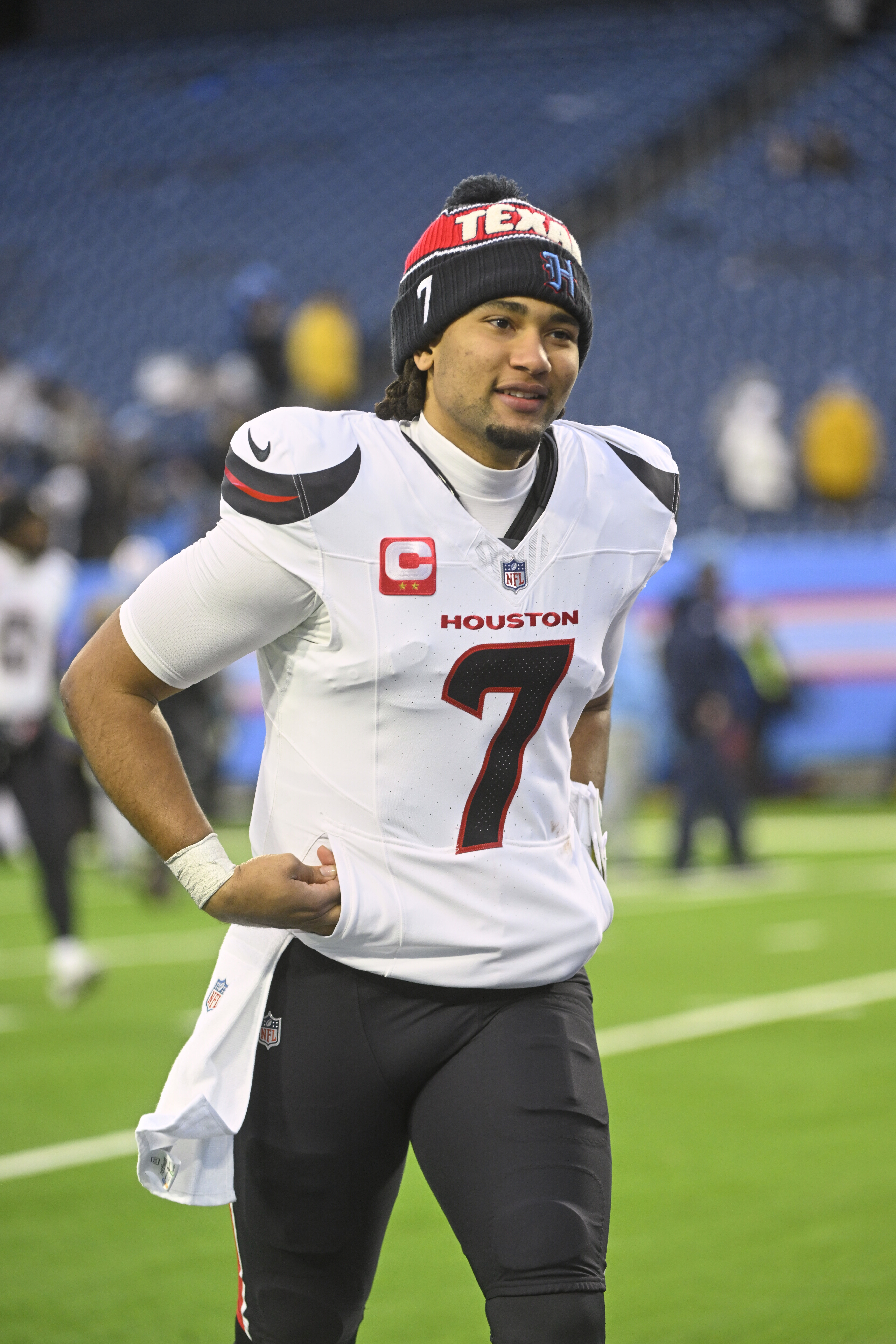 Houston Texans quarterback C.J. Stroud runs off the field after an NFL football game against the Tennessee Titans Sunday, Jan. 5, 2025, in Nashville, Tenn. The Texans won 23-14.