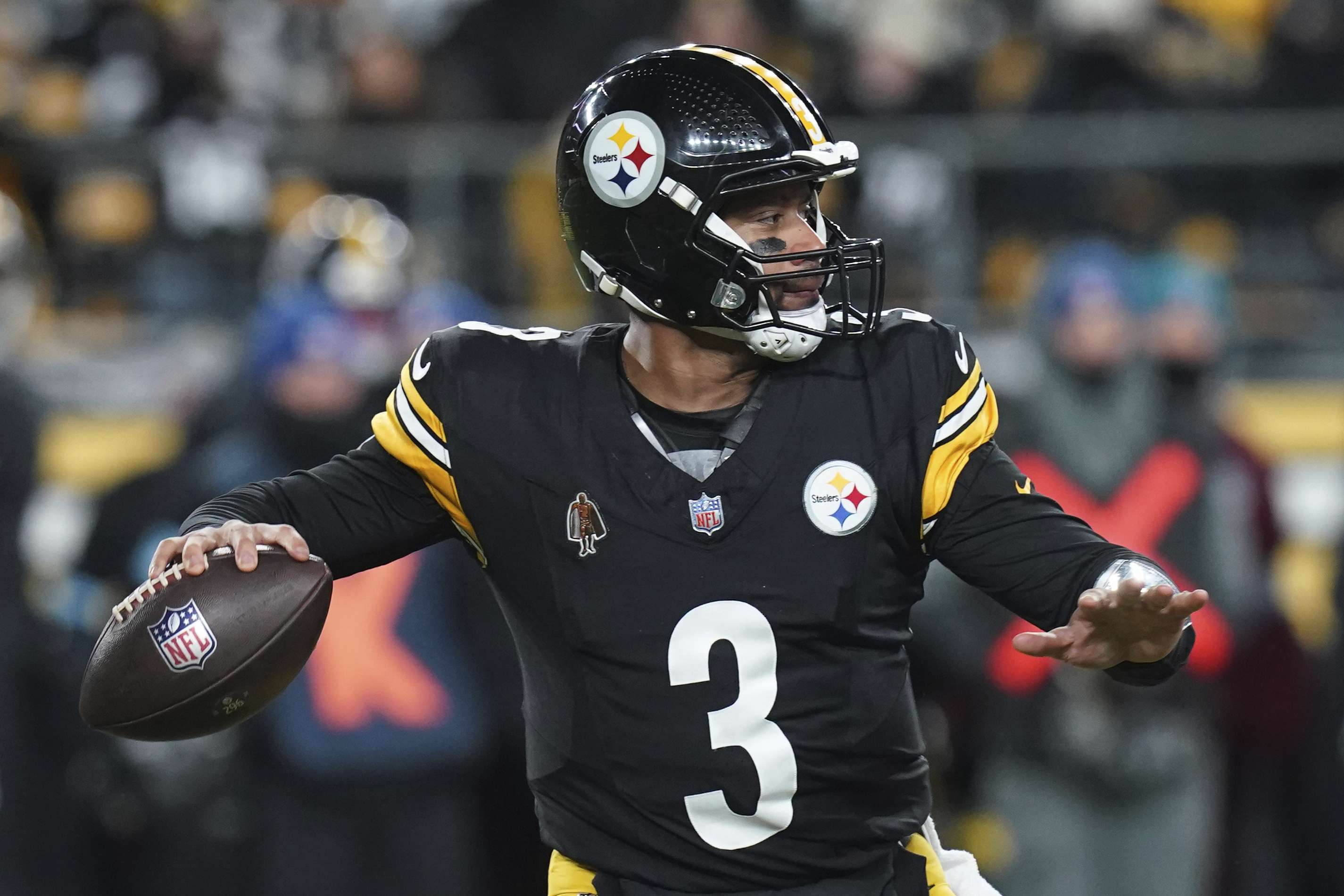 Pittsburgh Steelers quarterback Russell Wilson (3) throws a pass during the first half of an NFL football game against the Cincinnati Bengals in Pittsburgh, Saturday, Jan. 4, 2025.