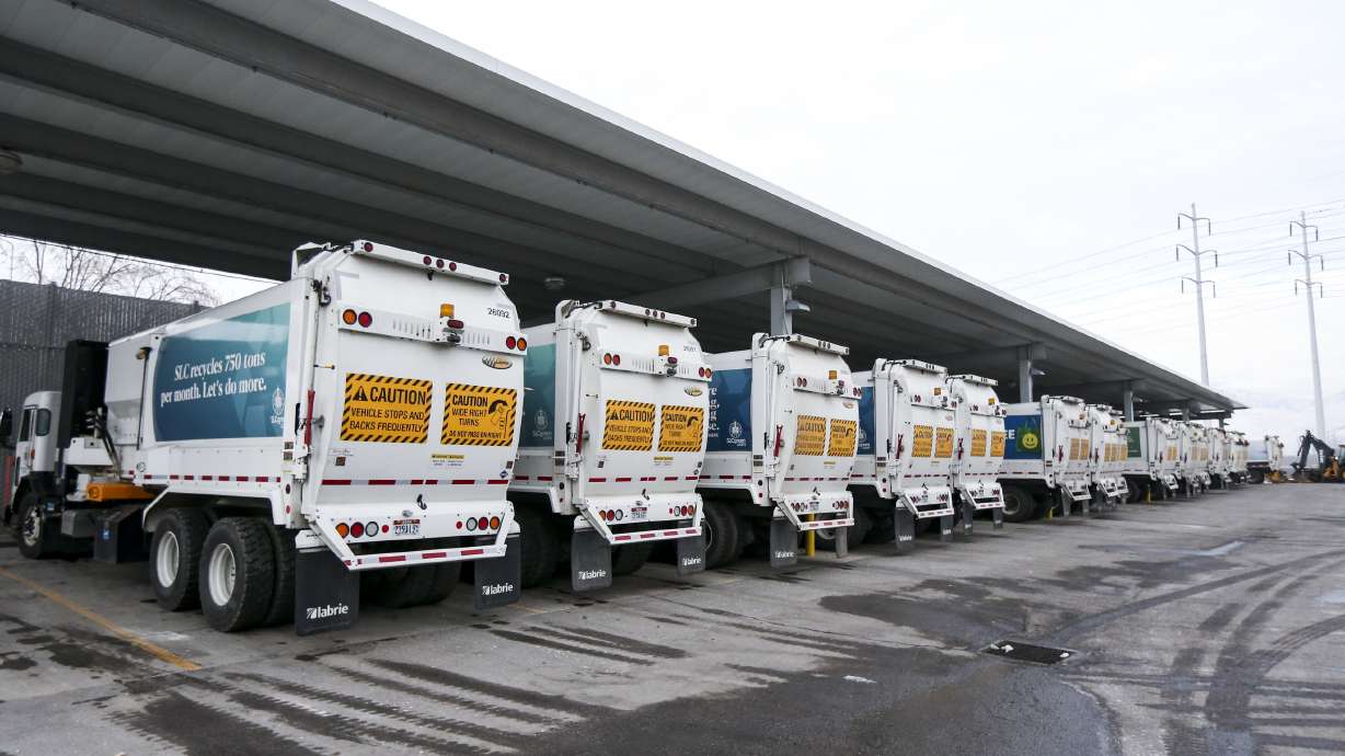 Garbage trucks sit in bays at the Salt Lake City Department of Public Services maintenance facility in Salt Lake City on Dec. 2, 2019. The city is changing its garbage collection schedule next month for the first time since the 1980s.