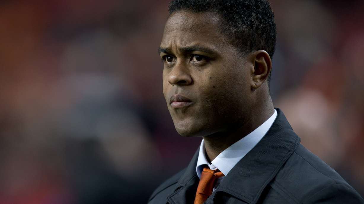 FILE - Assistant coach Patrick Kluivert of the Netherlands watches players ahead of a Group D World Cup qualifying soccer match against Estonia in Amsterdam, Netherlands, March 22, 2013.