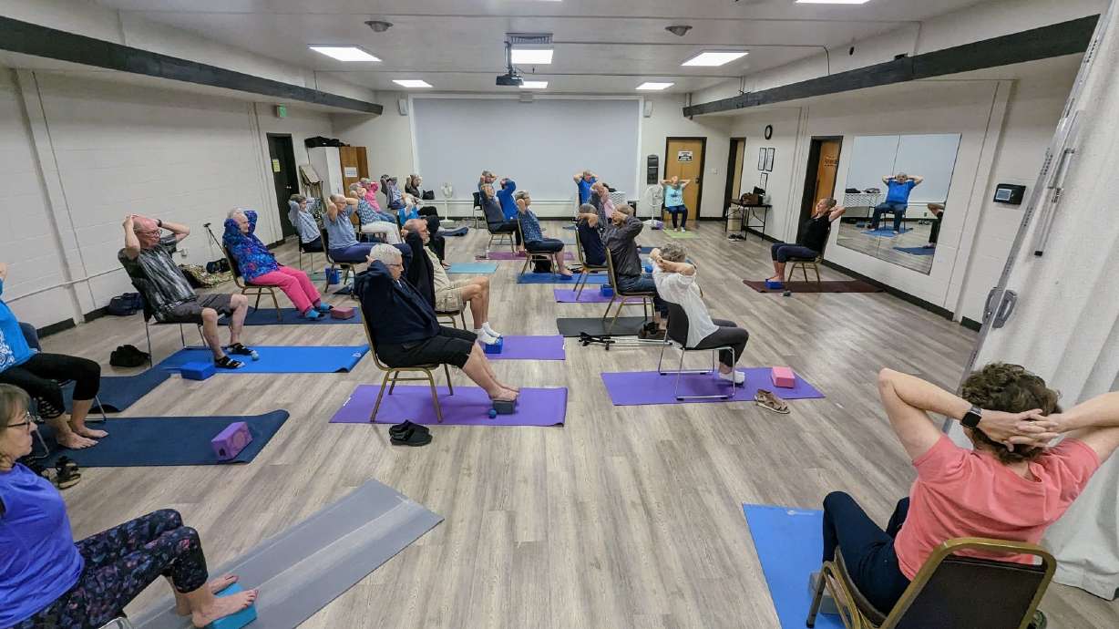 Cache County Senior Center attendees participate in chair yoga June 1, 2023. The county received a state grant Tuesday to conduct a feasibility study on a new senior center.
