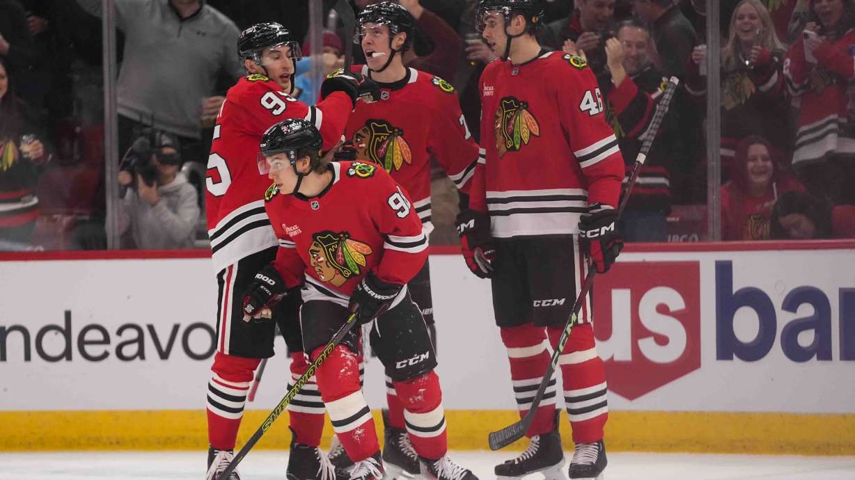 Chicago Blackhawks center Connor Bedard (98) skates back to the bench after getting the puck past Colorado Avalanche goaltender Trent Miner (50) but it is declared no goal during the second period of an NHL hockey game Wednesday, Jan. 8, 2025, in Chicago.