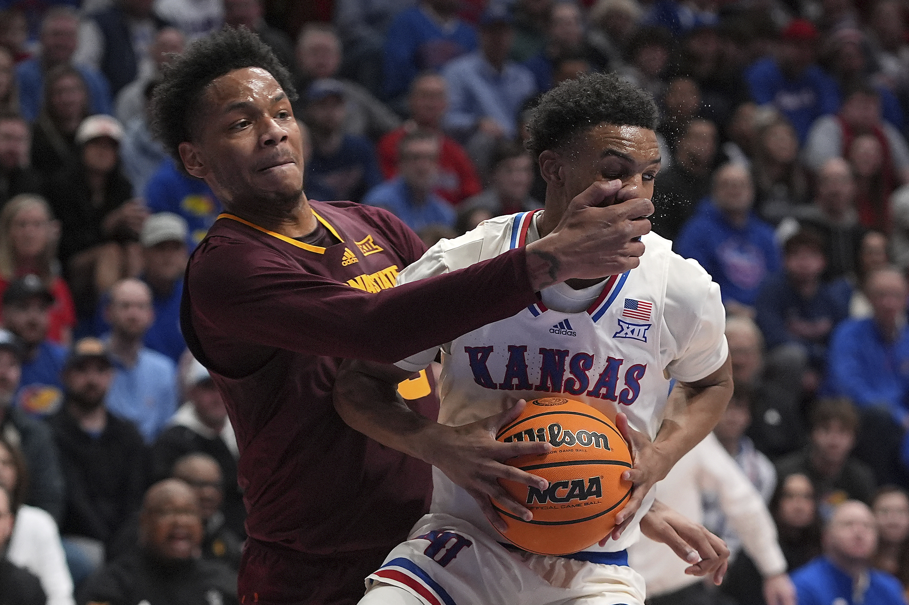 No. 11 Kansas shuts down Arizona State in 2nd half to win 74-55