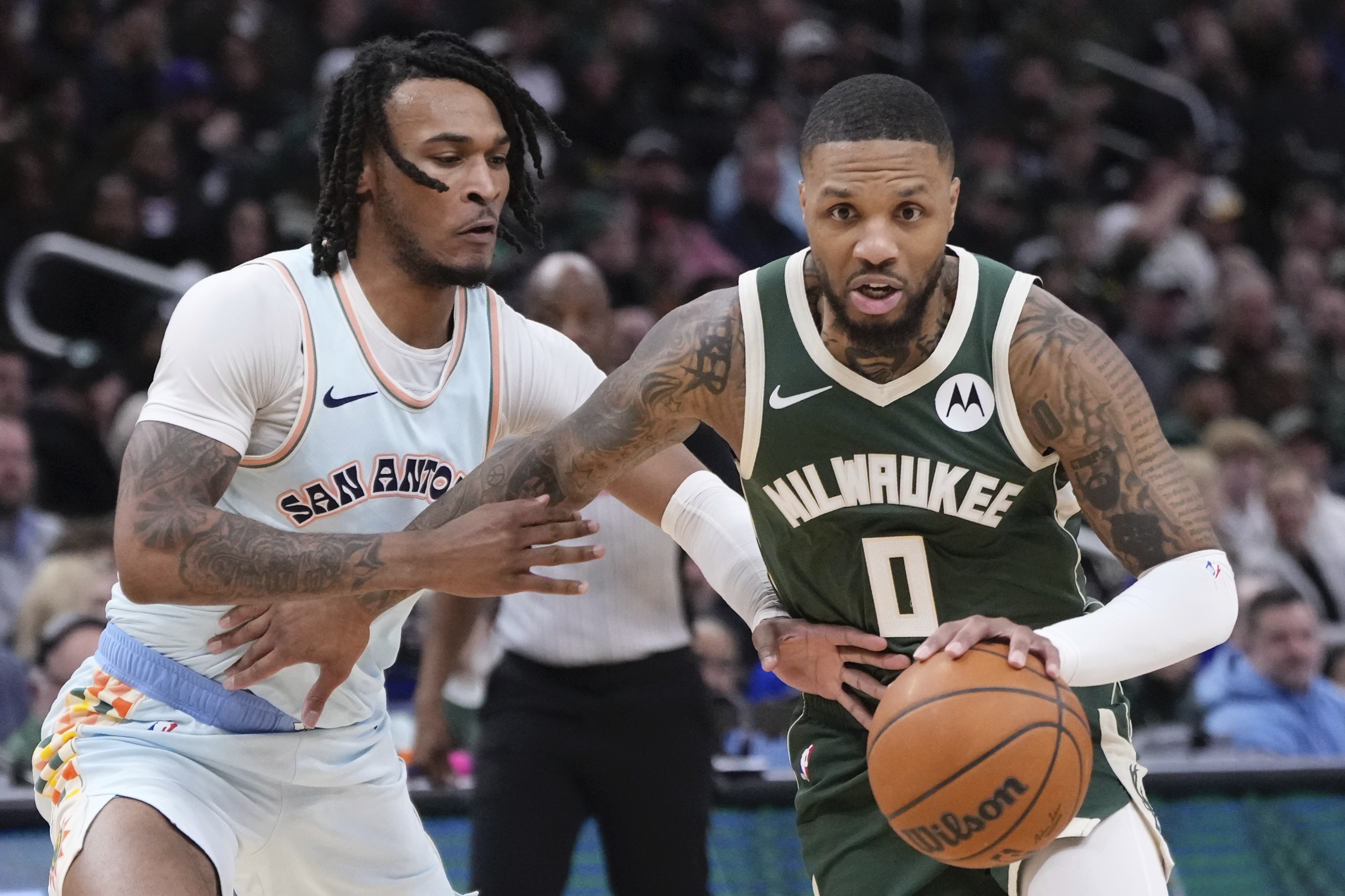 Lillard scores 26 points, Antetokounmpo adds 25 points and 16 rebounds as Bucks beat Spurs 121-105