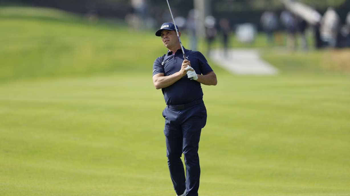 FILE - Gary Woodland hits from the seventh fairway during the first round of the Genesis Invitational golf tournament at Riviera Country Club, Thursday, Feb. 15, 2024, in the Pacific Palisades area of Los Angeles.