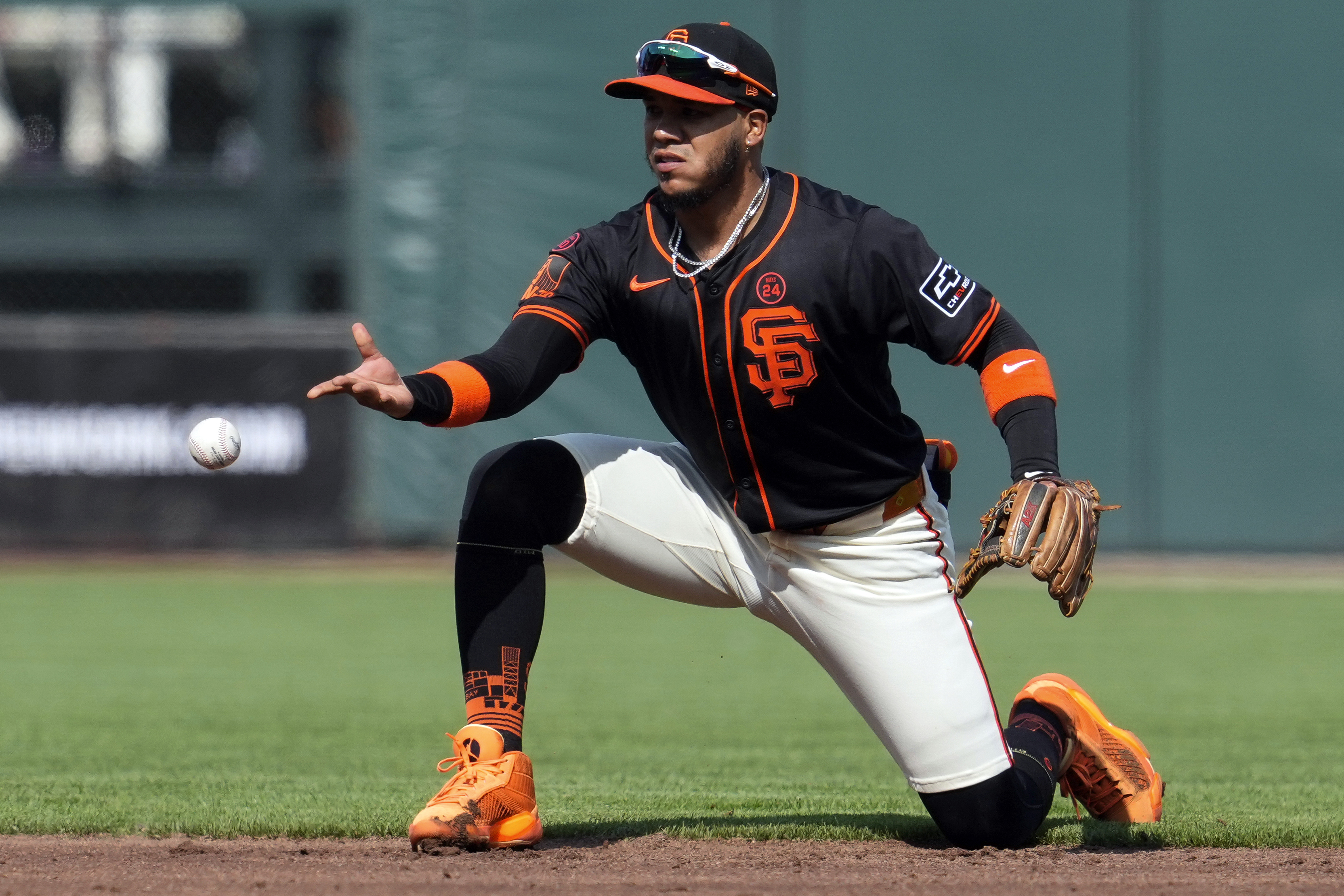 FILE - San Francisco Giants second baseman Thairo Estrada tosses the ball to shortstop Brett Wisely to force out Minnesota Twins' Carlos Santana at second during the second inning of a baseball game Saturday, July 13, 2024, in San Francisco.