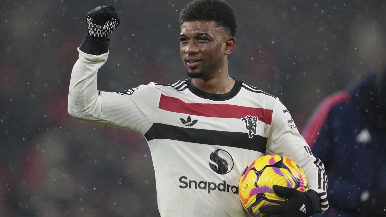 Manchester United's Amad Diallo reacts at the end of the English Premier League soccer match against Liverpool at the Anfield stadium in Liverpool, England Sunday, Jan. 5, 2025. The match ended in a 2-2 draw.