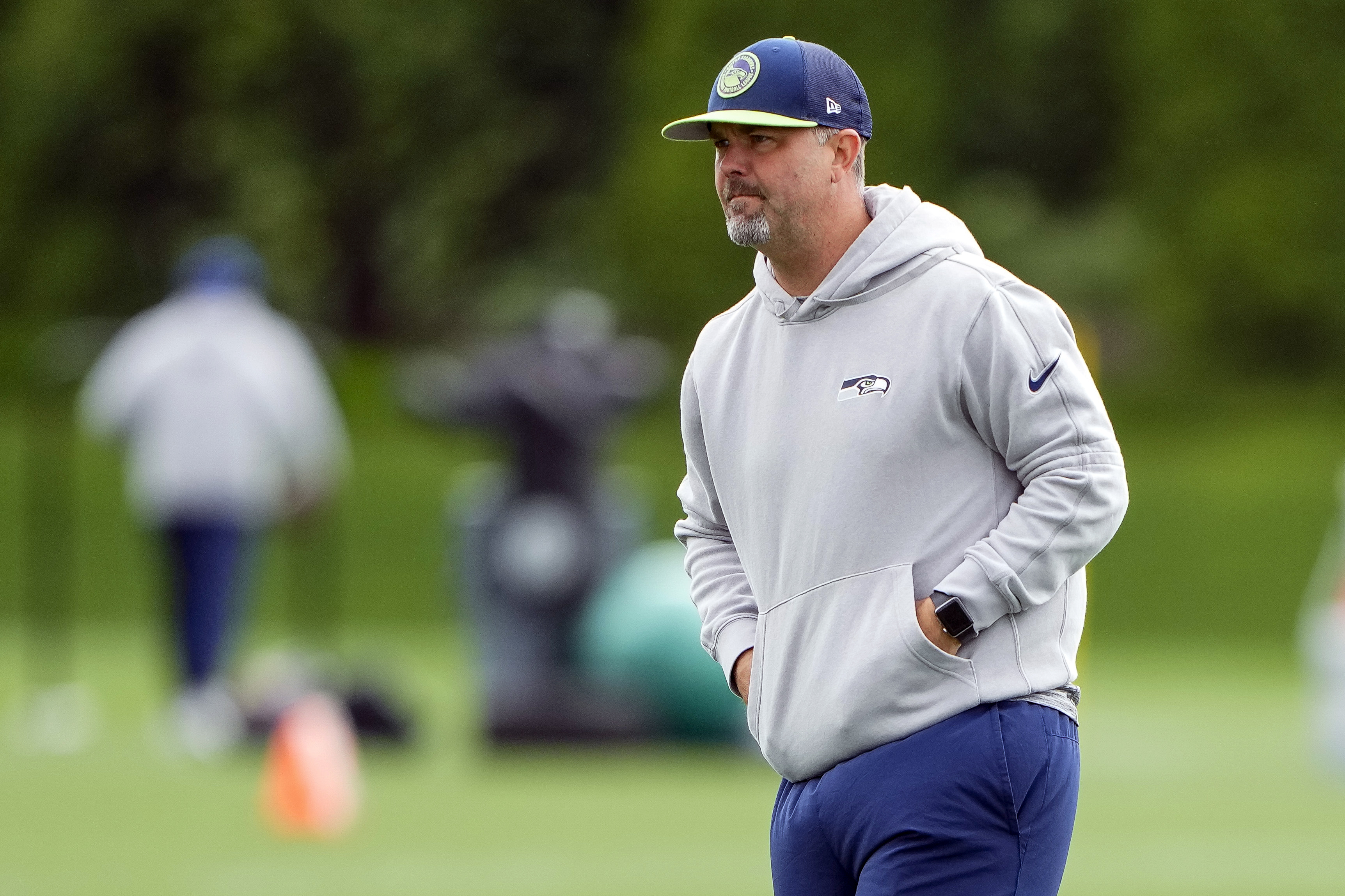FILE - Seattle Seahawks offensive assistant and quality control coach Zak Hill walks on the field during an NFL football practice, Monday, June 3, 2024, in Renton, Wash.