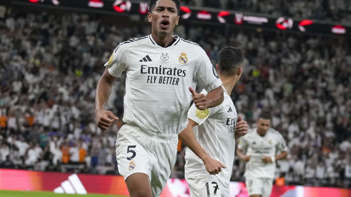 Real Madrid's Jude Bellingham celebrates after scoring his side's opening goal during the Spanish Super Cup semifinal soccer match between Real Madrid and Mallorca at the King Abdullah Stadium in Jeddah, Saudi Arabia, Thursday, Jan. 9, 2025.