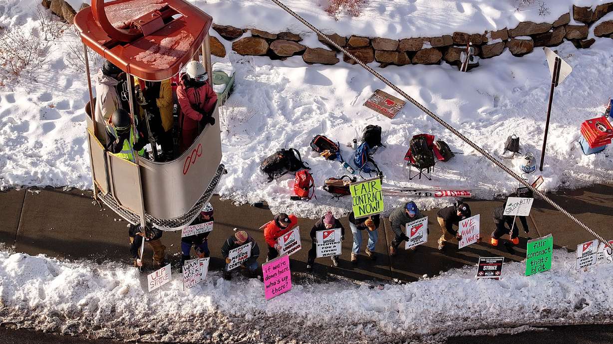 Park City Mountain ski patrollers on strike at Park City Mountain Canyons Village in Park City on Jan. 2. An Illinois man filed a class action lawsuit on Thursday against Park City Mountain's owner over his visitor experience during the strike.