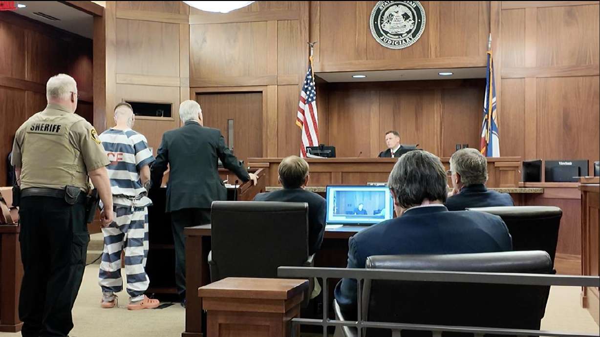 Randy Lessing stands next to his attorney as he is sentenced for child abuse homicide on Tuesday.
