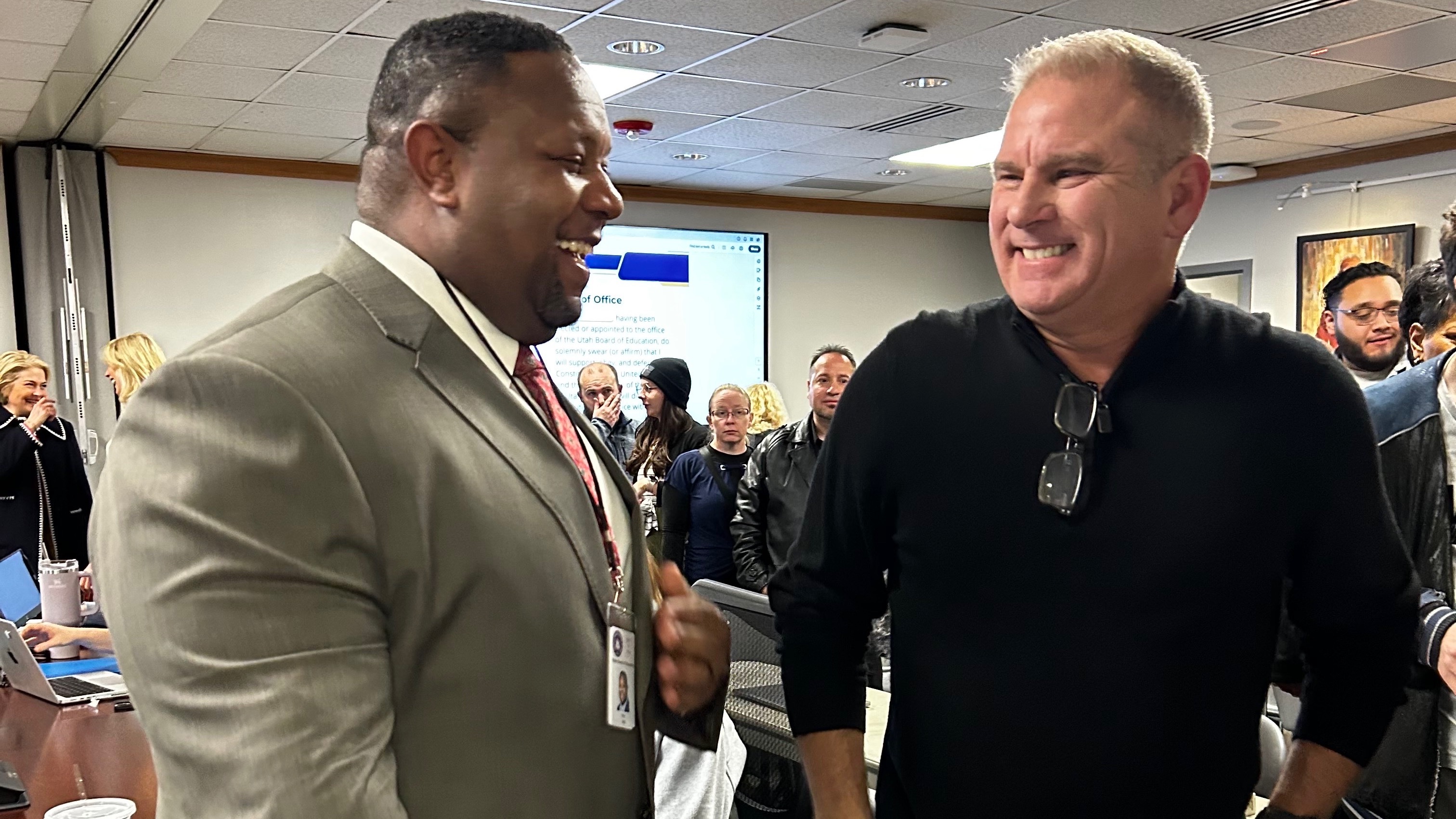 Rod Hall, left, at his inauguration to a post on the Utah Board of Education in Salt Lake City on Thursday. He's with Pastor Chuck Beickel of Faith Baptist Church in Layton, where Hall serves as student ministries pastor.