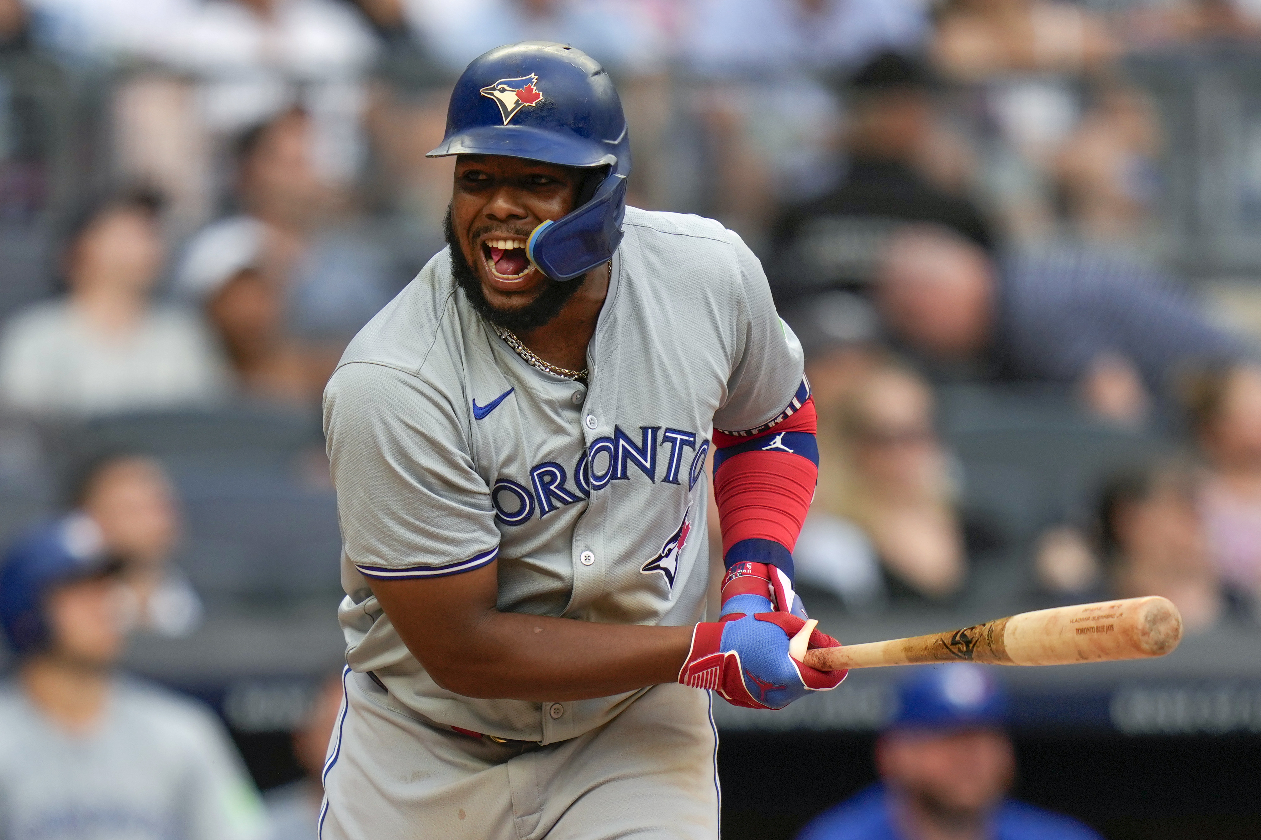 FILE - Toronto Blue Jays' Vladimir Guerrero Jr. reacts as he flies out during the eighth inning of a baseball game against the New York Yankees at Yankee Stadium, Sunday, Aug. 4, 2024, in New York.