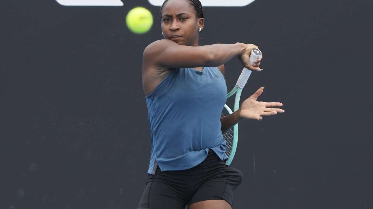 Coco Gauff of the United States plays a forehand return during a practice session ahead of the Australian Open tennis championship in Melbourne, Australia, Thursday, Jan. 9, 2025.